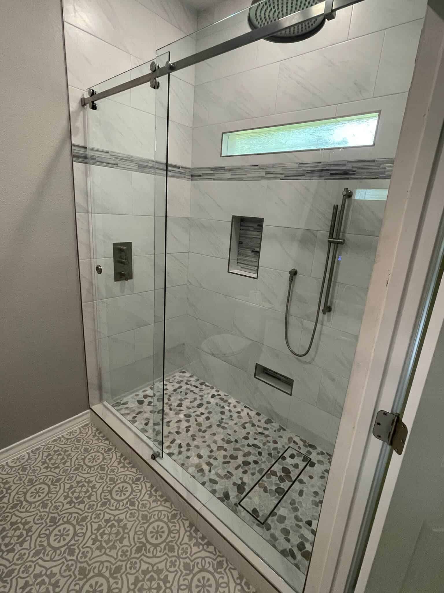 Home bathroom glass door installation by Shades of Texas