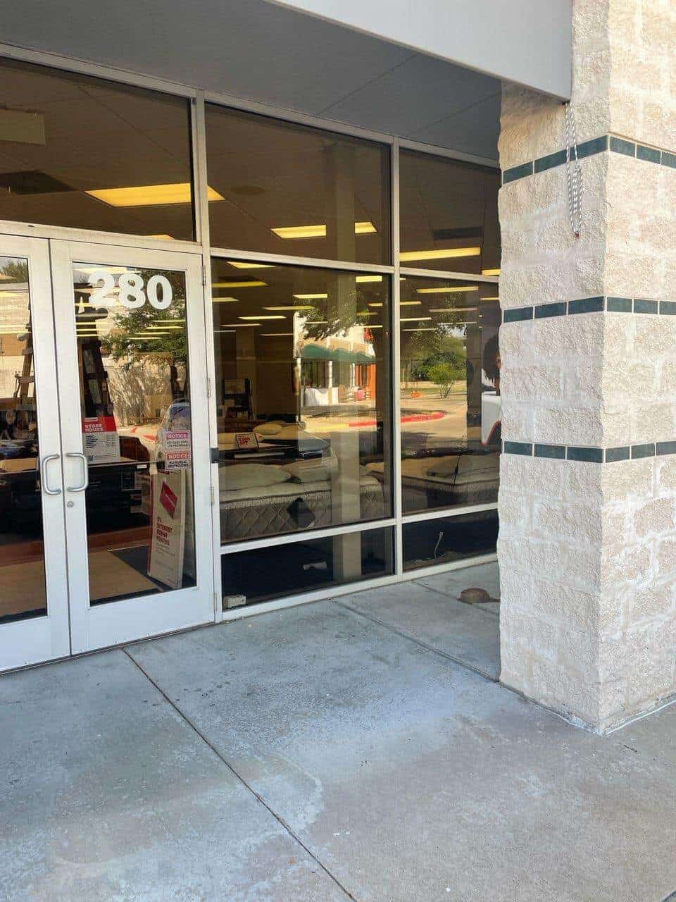 Commercial store front glass installation completed by Shades of Texas