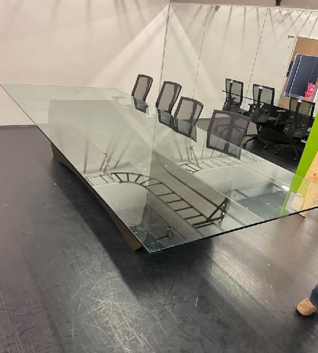 Glass conference table in office installed by Shades of Texas.